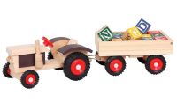 Traktor s gumovými koly a vlečkou ABC